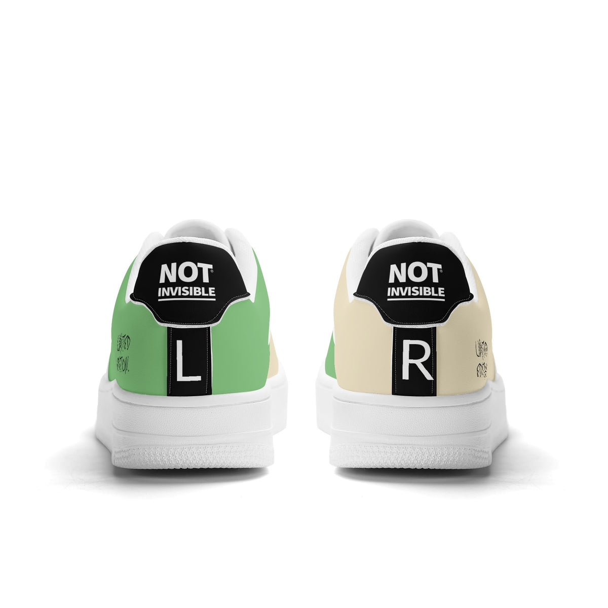 Pair of sneakers with 'Not Invisible' labels on a white background