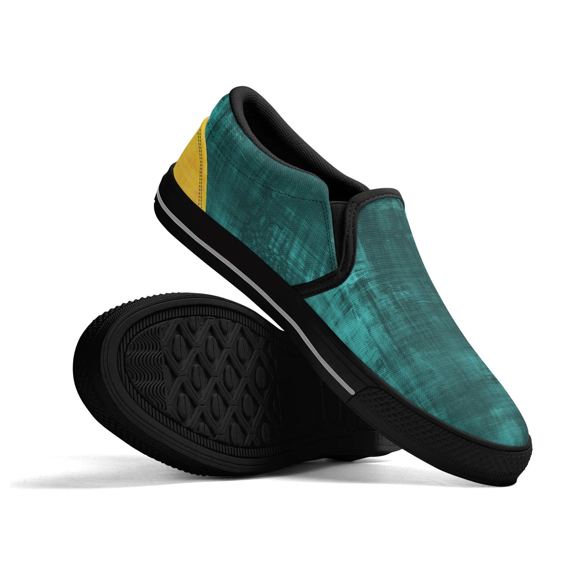 Green slip-on shoes with black soles on a white background