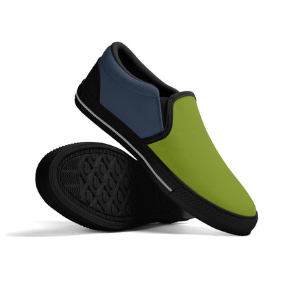 Green and black slip-on shoes on a white background