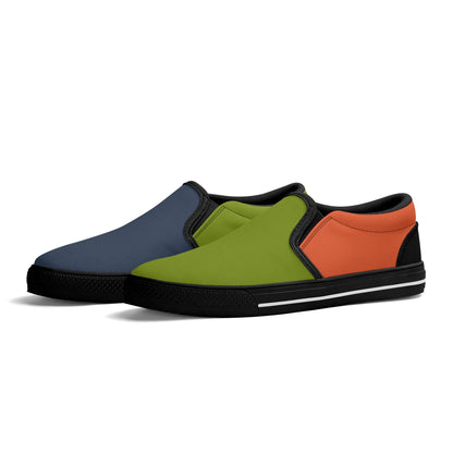 Colorful slip-on shoes with blue, green, and orange sections on a white background