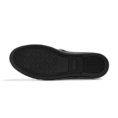 Black shoe sole with tread pattern on a white background