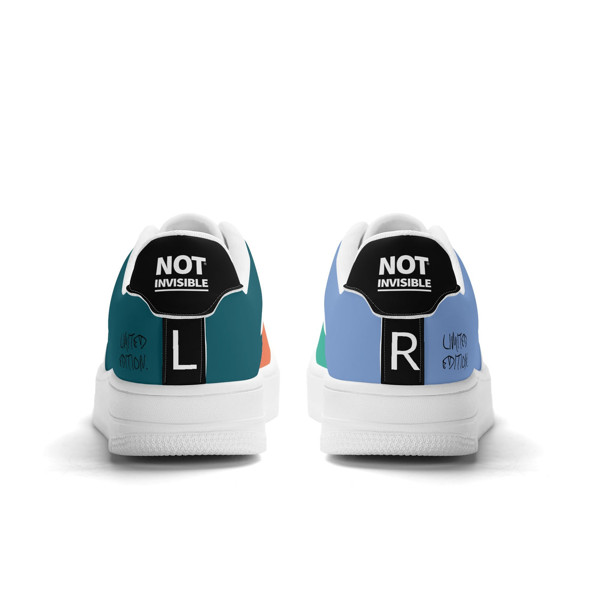 Pair of sneakers with 'NOT INVISIBLE' labels on a white background