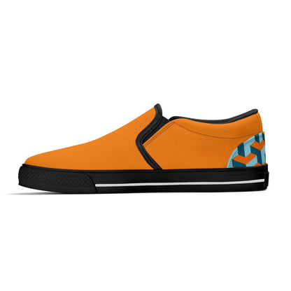 Orange slip-on shoe with black sole on a white background