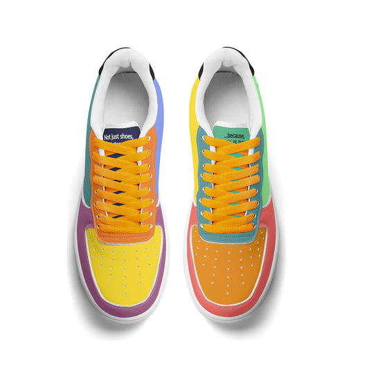 Colorful sneakers with orange laces on a white background