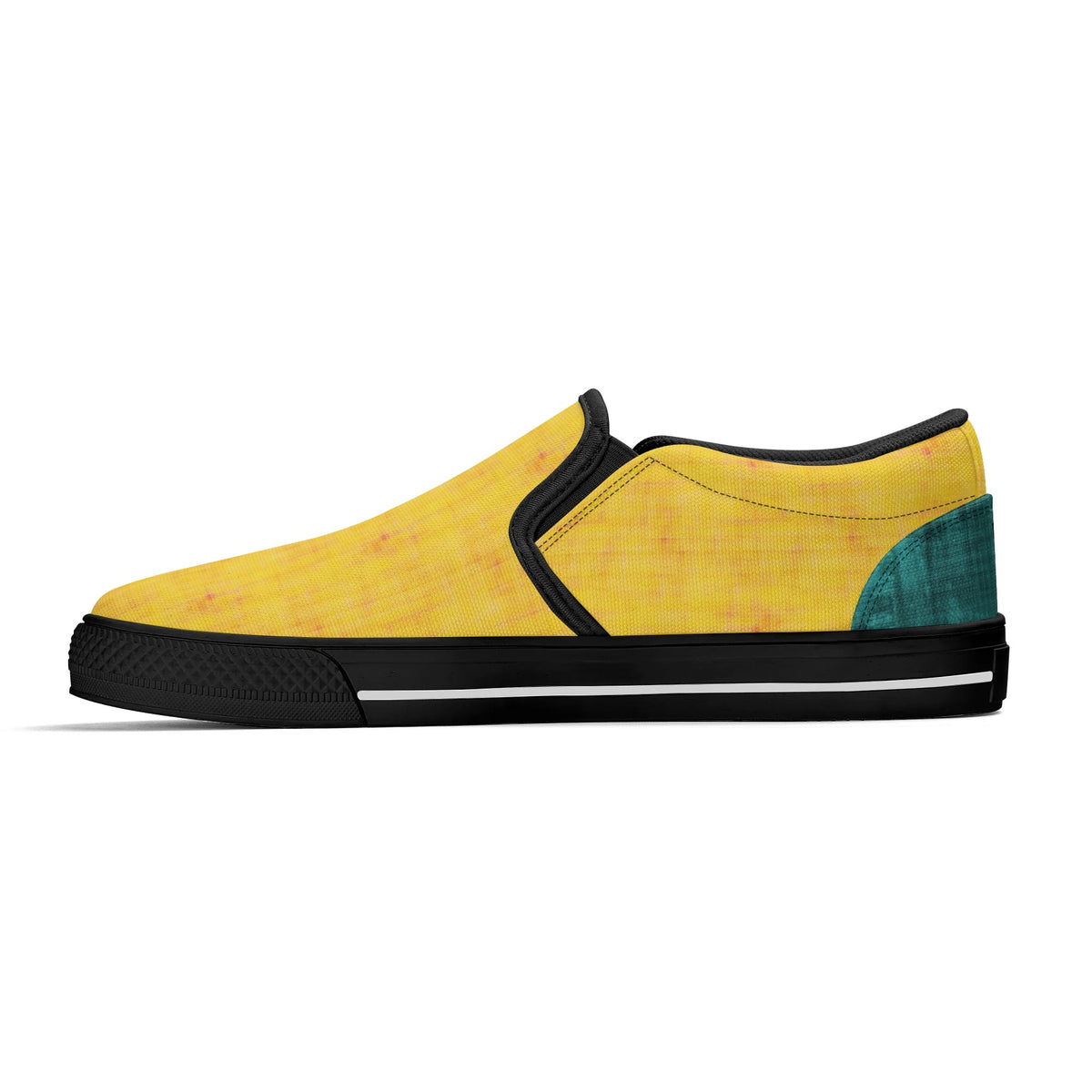 Yellow slip-on sneaker with black and green accents on a white background
